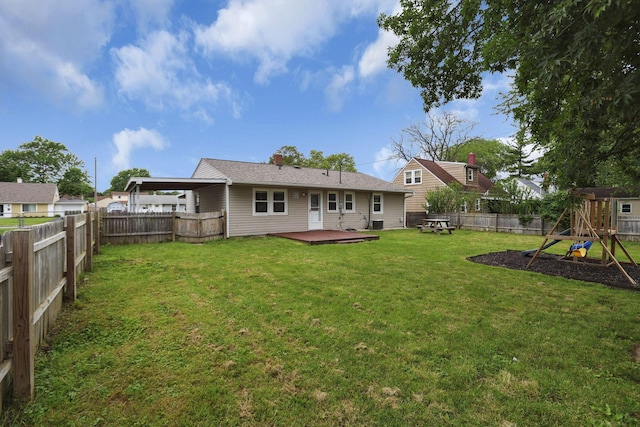 372 Sturbridge Rd, Columbus, OH 43228 - rear view of house featuring a fenced backyard, a deck, and a playground
