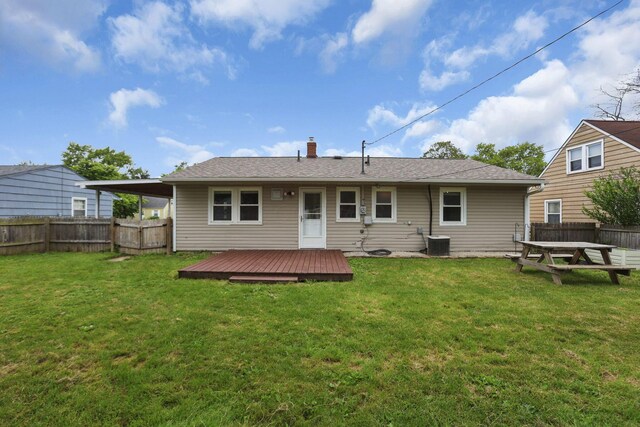 372 Sturbridge Rd, Columbus, OH 43228 - rear view of property featuring a fenced backyard, a wooden deck, and a chimney