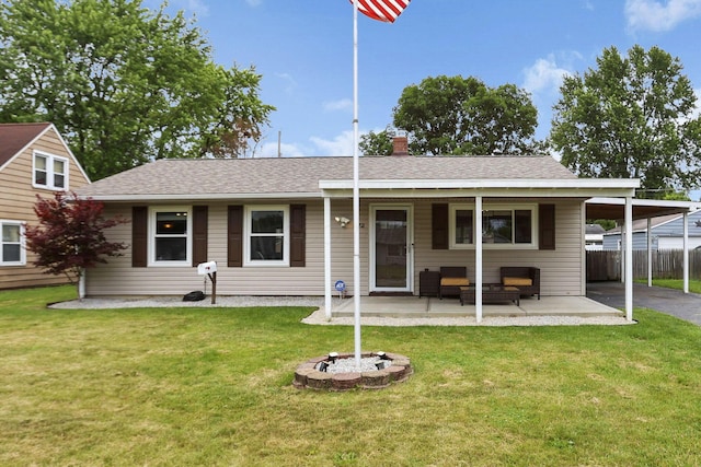 372 Sturbridge Rd, Columbus, OH 43228 - view of front of property featuring an outdoor hangout area, a chimney, roof with shingles, a patio, and driveway