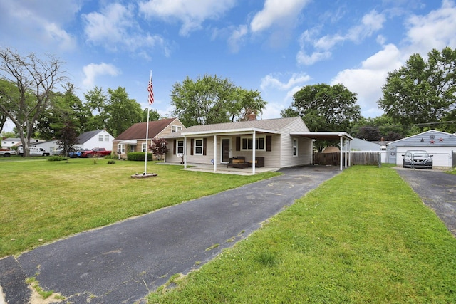 372 Sturbridge Rd, Columbus, OH 43228 - ranch-style house with driveway, covered porch, an attached carport, and a chimney