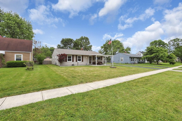 372 Sturbridge Rd, Columbus, OH 43228 - view of front facade with a front lawn and a chimney