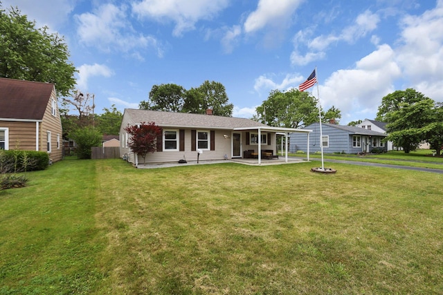372 Sturbridge Rd, Columbus, OH 43228 - view of front of property featuring a patio, a chimney, and a carport