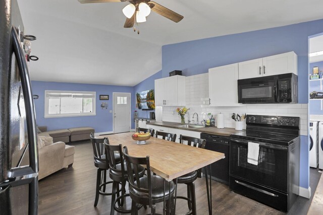 372 Sturbridge Rd, Columbus, OH 43228 - kitchen with black appliances, washing machine and clothes dryer, a ceiling fan, white cabinets, and backsplash