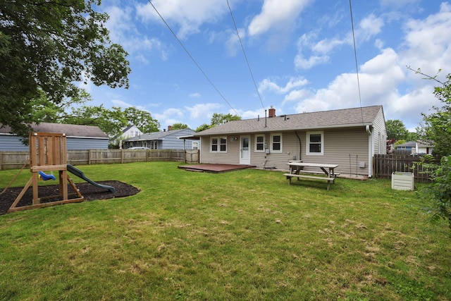 372 Sturbridge Rd, Columbus, OH 43228 - rear view of property featuring a fenced backyard, a deck, and a chimney