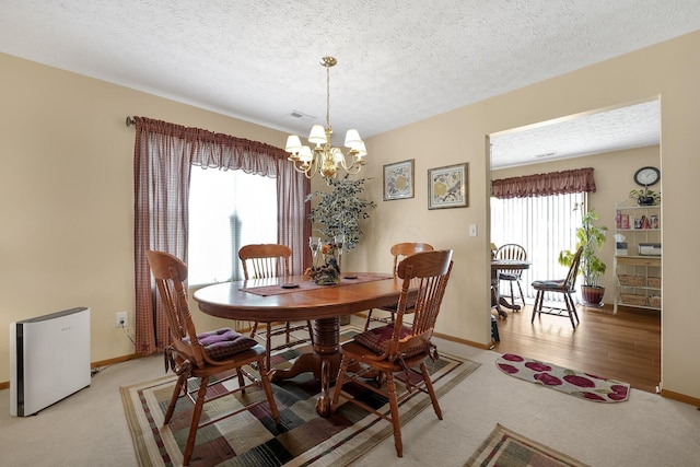 50 Bazler Ln, South Bloomfield, OH 43103 - dining area with a chandelier and a textured ceiling