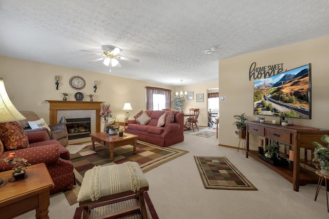 50 Bazler Ln, South Bloomfield, OH 43103 - living area featuring a ceiling fan, light colored carpet, a textured ceiling, a glass covered fireplace, and a chandelier