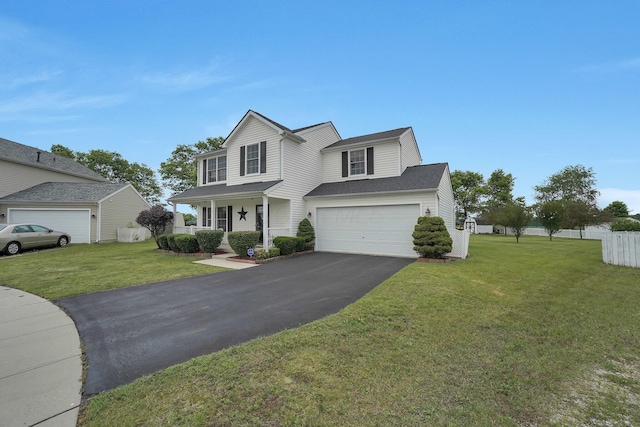 50 Bazler Ln, South Bloomfield, OH 43103 - traditional-style house with driveway, covered porch, and an attached garage