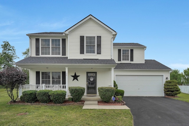 50 Bazler Ln, South Bloomfield, OH 43103 - traditional-style home with driveway, covered porch, a front lawn, and roof with shingles