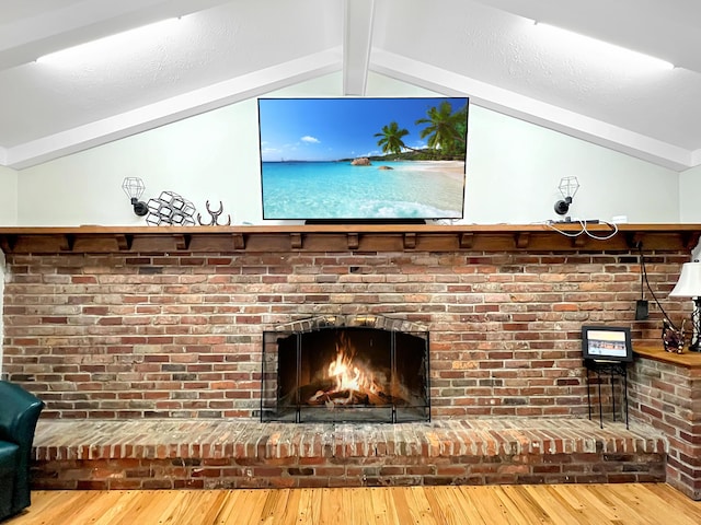 4713 Haughn Rd, Grove City, OH 43123 - detailed view of wood finished floors, beamed ceiling, and a fireplace