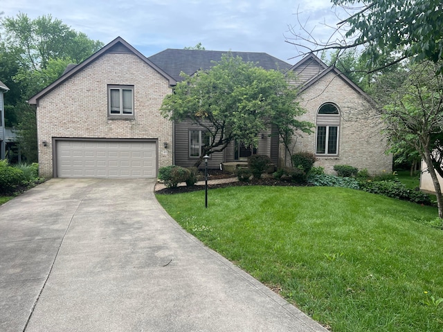 471 Old Mill Dr, Columbus, OH 43230 - view of front of house featuring brick siding, a garage, concrete driveway, and a front lawn