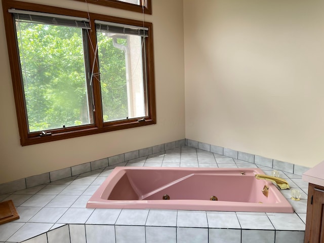 471 Old Mill Dr, Columbus, OH 43230 - full bathroom featuring a whirlpool tub, plenty of natural light, and vanity