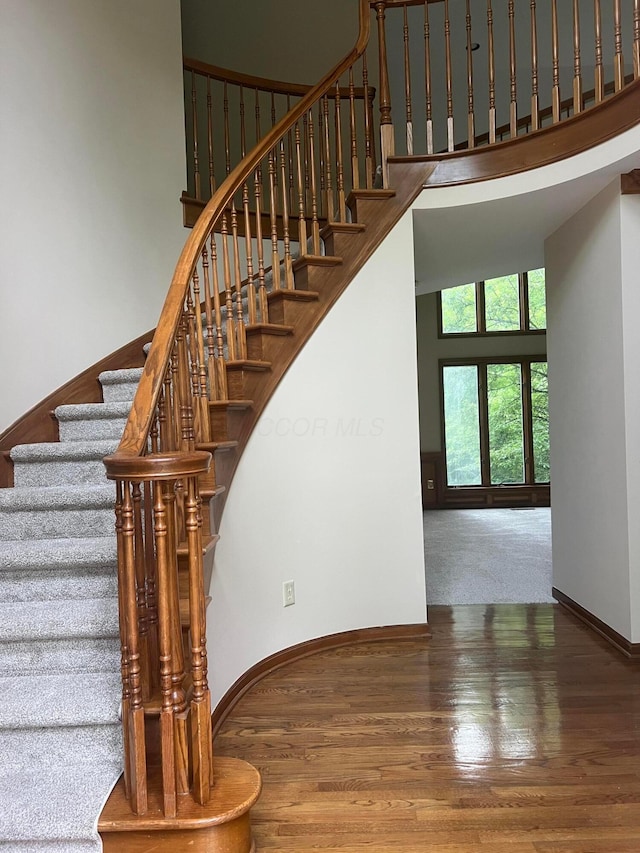 471 Old Mill Dr, Columbus, OH 43230 - stairway with a towering ceiling and wood finished floors