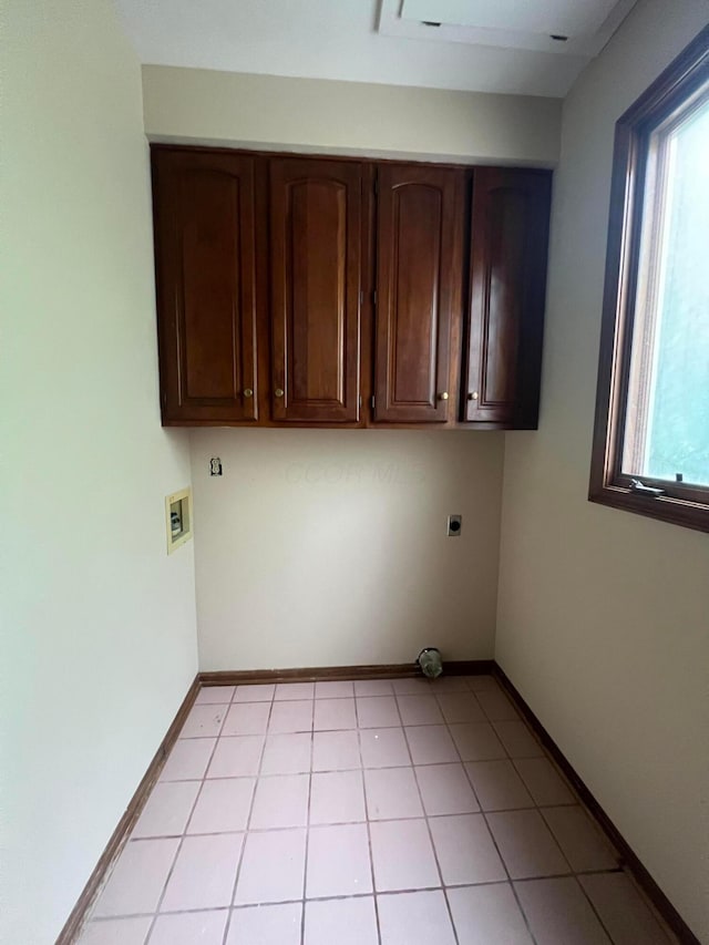 471 Old Mill Dr, Columbus, OH 43230 - laundry room with cabinet space, healthy amount of natural light, hookup for an electric dryer, and hookup for a washing machine