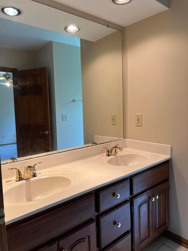 471 Old Mill Dr, Columbus, OH 43230 - bathroom with double vanity, tile patterned flooring, and recessed lighting