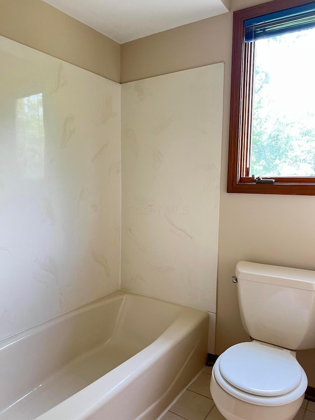 471 Old Mill Dr, Columbus, OH 43230 - full bathroom with a tub and tile patterned flooring