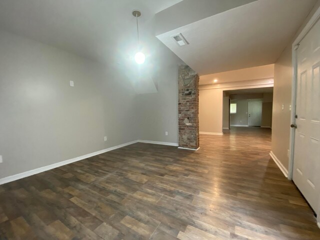 128 S Princeton Ave, Columbus, OH 43222 - unfurnished living room featuring dark wood-style floors and baseboards
