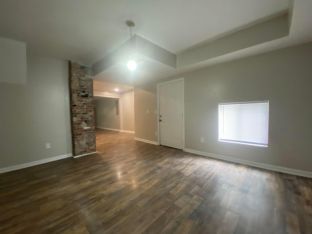 128 S Princeton Ave, Columbus, OH 43222 - unfurnished living room featuring dark wood finished floors and baseboards