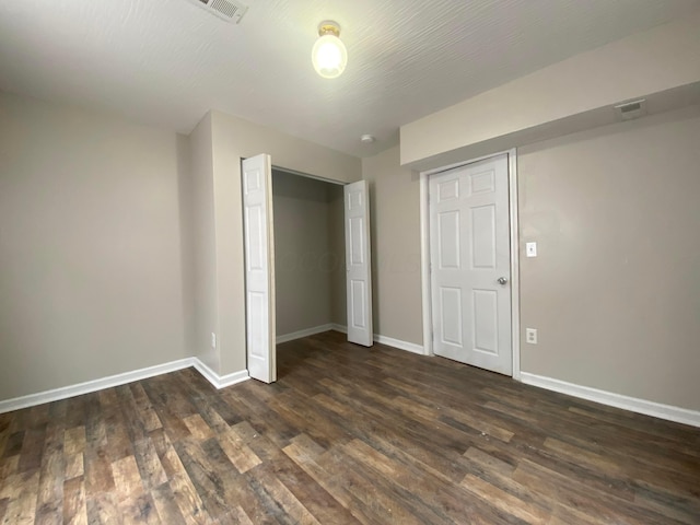 128 S Princeton Ave, Columbus, OH 43222 - unfurnished bedroom with dark wood finished floors