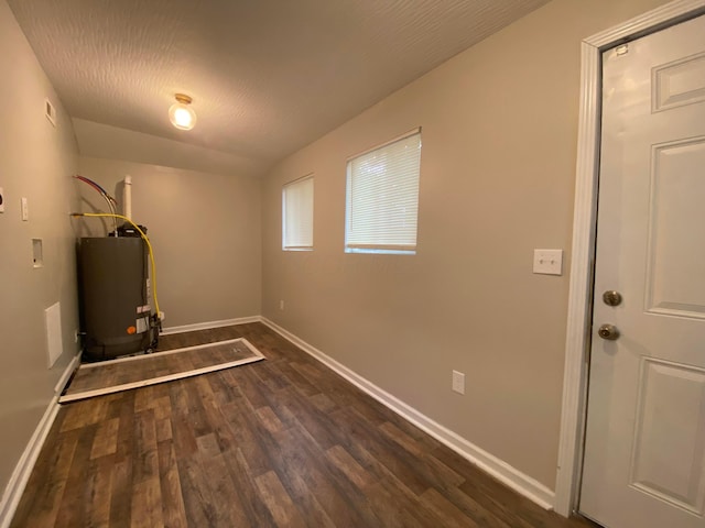 128 S Princeton Ave, Columbus, OH 43222 - laundry room featuring gas water heater and dark wood-type flooring