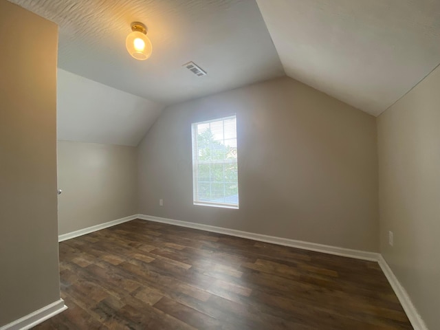 128 S Princeton Ave, Columbus, OH 43222 - additional living space with dark wood finished floors and vaulted ceiling