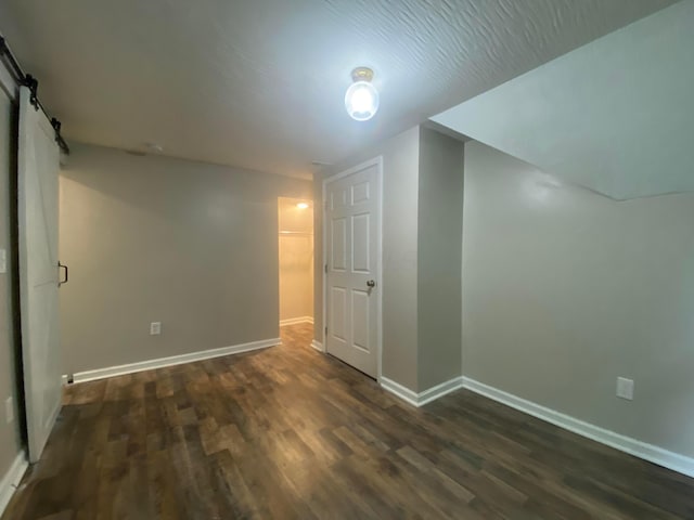 128 S Princeton Ave, Columbus, OH 43222 - additional living space with dark wood finished floors and a barn door