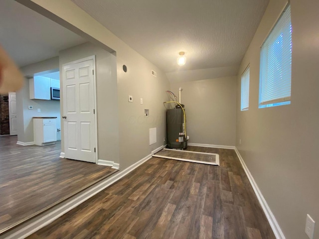 128 S Princeton Ave, Columbus, OH 43222 - hall featuring dark wood-style floors and water heater