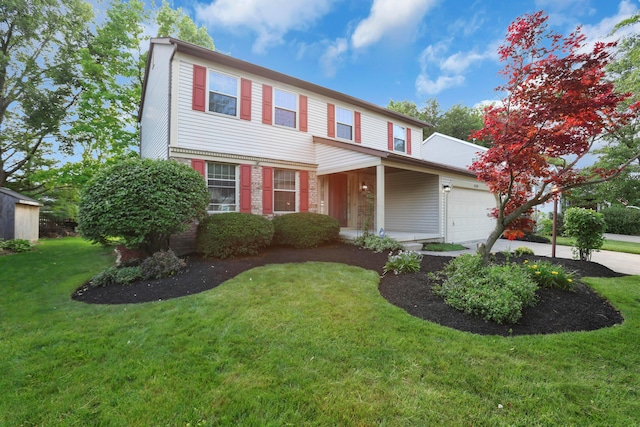 8139 Storrow Dr, Westerville, OH 43081 - view of front of home featuring a garage, asphalt driveway, and a front lawn