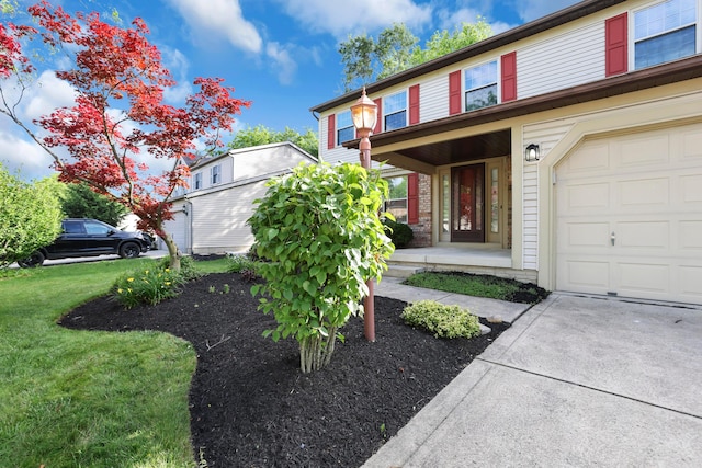 8139 Storrow Dr, Westerville, OH 43081 - traditional home with a garage, brick siding, and a front yard