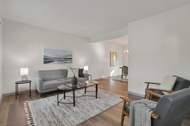 8139 Storrow Dr, Westerville, OH 43081 - living area with a chandelier and wood finished floors