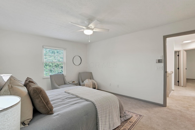 8139 Storrow Dr, Westerville, OH 43081 - bedroom featuring light carpet, a ceiling fan, and a textured ceiling