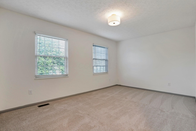 8139 Storrow Dr, Westerville, OH 43081 - empty room with light colored carpet and a textured ceiling