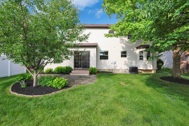 8139 Storrow Dr, Westerville, OH 43081 - back of house featuring a yard