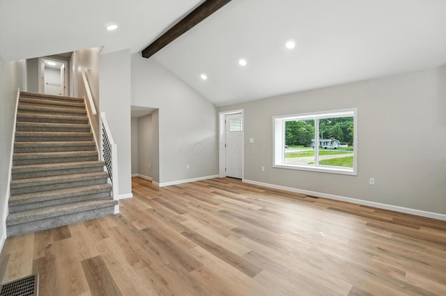 4615 County Road 23, Cardington, OH 43315 - unfurnished living room featuring stairs, light wood-style flooring, and recessed lighting