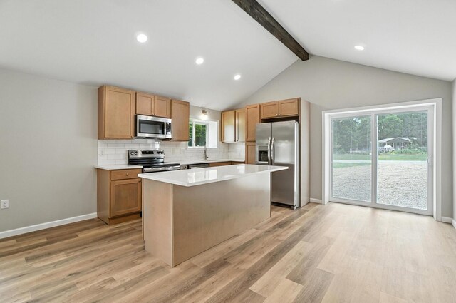 4615 County Road 23, Cardington, OH 43315 - kitchen featuring appliances with stainless steel finishes, tasteful backsplash, light wood-style floors, a center island, and recessed lighting