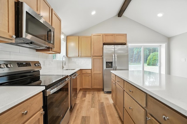 4615 County Road 23, Cardington, OH 43315 - kitchen with appliances with stainless steel finishes, light wood-style floors, plenty of natural light, decorative backsplash, and recessed lighting