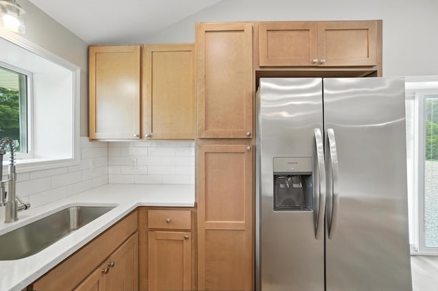 4615 County Road 23, Cardington, OH 43315 - kitchen featuring stainless steel fridge with ice dispenser, decorative backsplash, and light countertops