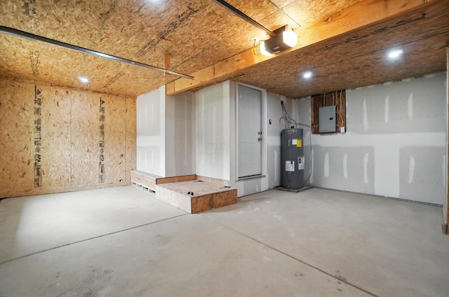 4615 County Road 23, Cardington, OH 43315 - below grade area featuring electric water heater, electric panel, and recessed lighting