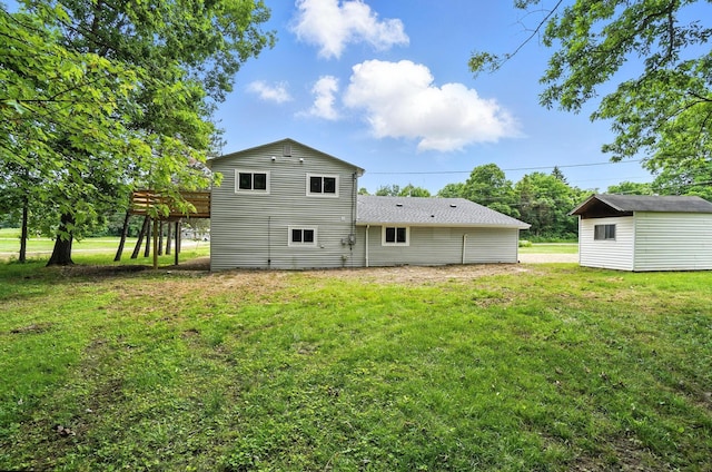 4615 County Road 23, Cardington, OH 43315 - back of house featuring a lawn, a wooden deck, and a shed