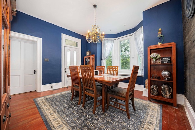 1871 Galloway Rd, Galloway, OH 43119 - dining area featuring a chandelier and wood finished floors