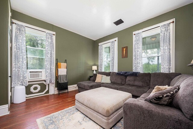 1871 Galloway Rd, Galloway, OH 43119 - living area with cooling unit and wood finished floors