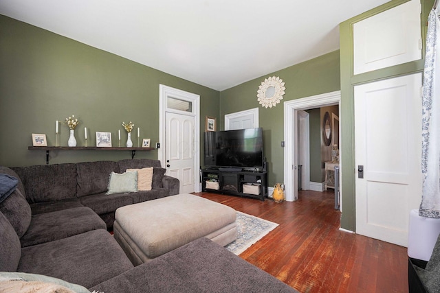 1871 Galloway Rd, Galloway, OH 43119 - living room featuring dark wood-style flooring and baseboards