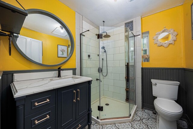 1871 Galloway Rd, Galloway, OH 43119 - full bathroom featuring vanity, a wainscoted wall, a shower stall, and tile patterned floors