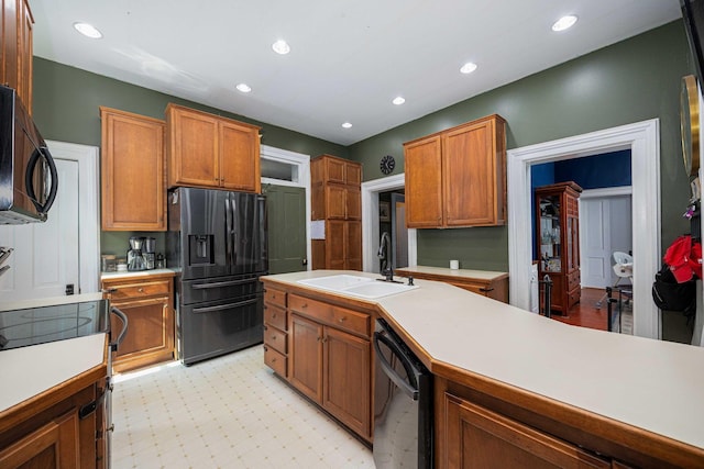 1871 Galloway Rd, Galloway, OH 43119 - kitchen featuring black appliances, light countertops, light floors, recessed lighting, and a desk