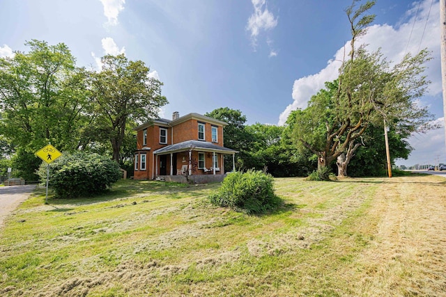 1871 Galloway Rd, Galloway, OH 43119 - view of grassy yard featuring a porch