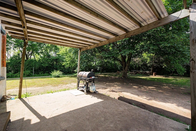 1871 Galloway Rd, Galloway, OH 43119 - view of patio with area for grilling and view of wooded area