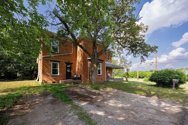 1871 Galloway Rd, Galloway, OH 43119 - view of front of home with brick siding and a front lawn