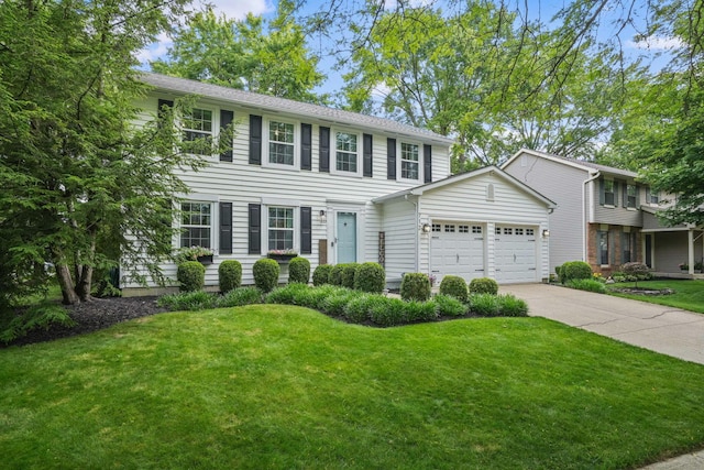 712 Suntree Dr, Westerville, OH 43081 - view of front facade with a garage, a front yard, and concrete driveway