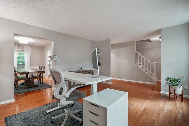 712 Suntree Dr, Westerville, OH 43081 - home office featuring a textured ceiling and light wood-style floors