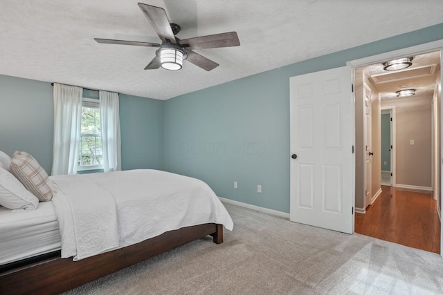 712 Suntree Dr, Westerville, OH 43081 - carpeted bedroom featuring a textured ceiling and ceiling fan