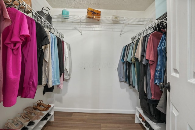 712 Suntree Dr, Westerville, OH 43081 - spacious closet featuring wood finished floors